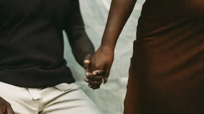 A couple holding hands